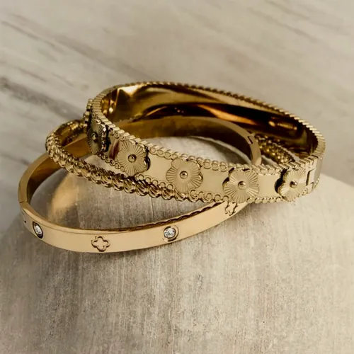 Trio of clover bangles.