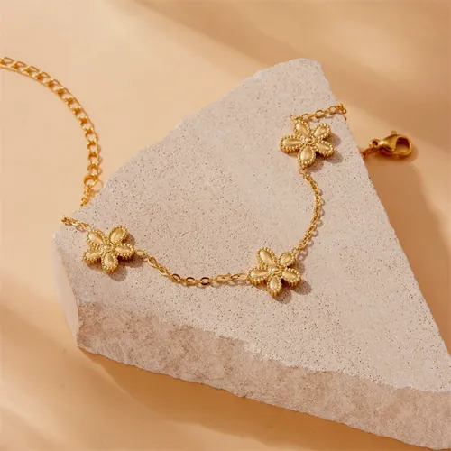 Golden flower necklace and earring set.
