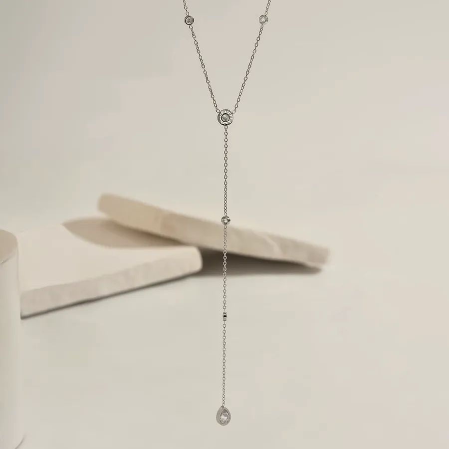 Silver-tone lariat necklace with cubic zirconia.